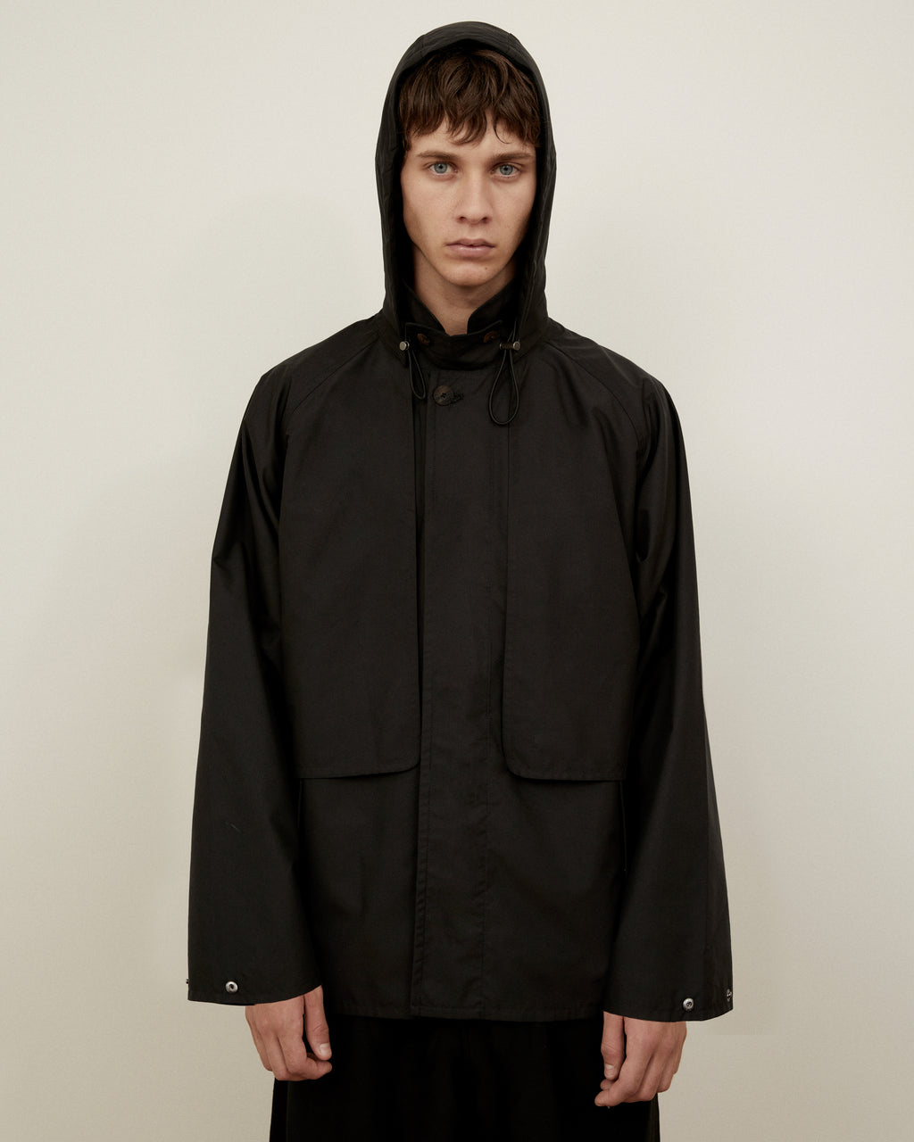 Morrow Australia Fashion black dry jacket with hood on