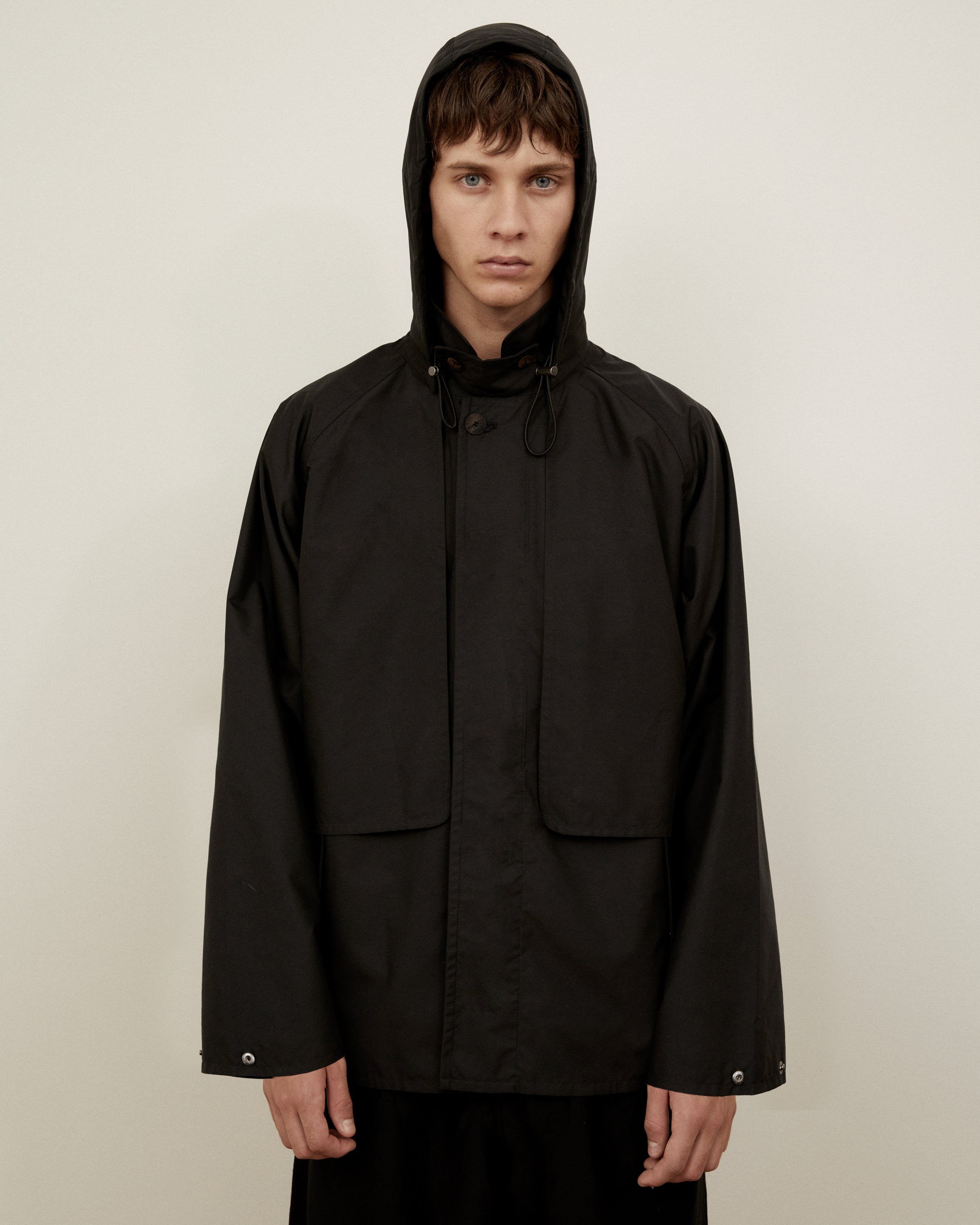 Morrow Australia Fashion black dry jacket with hood on